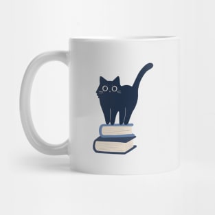 Cat on pile of books Mug